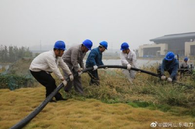 梁山县供电公司敷设电缆 服务东部新城建设